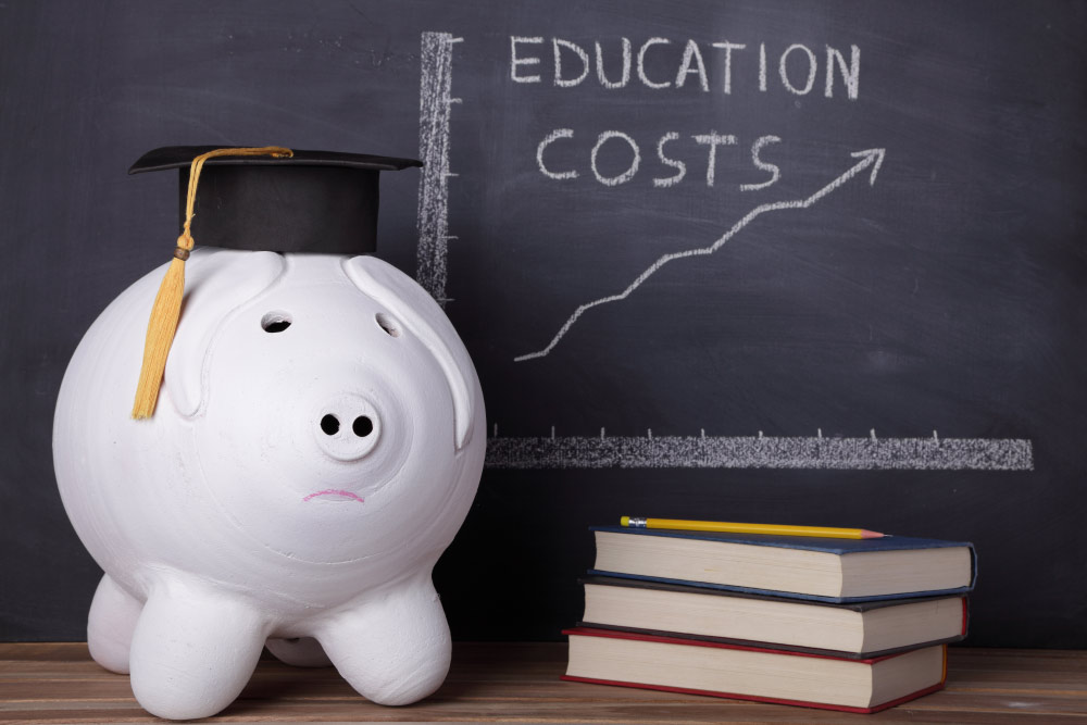piggy bank with chart of rising education costs